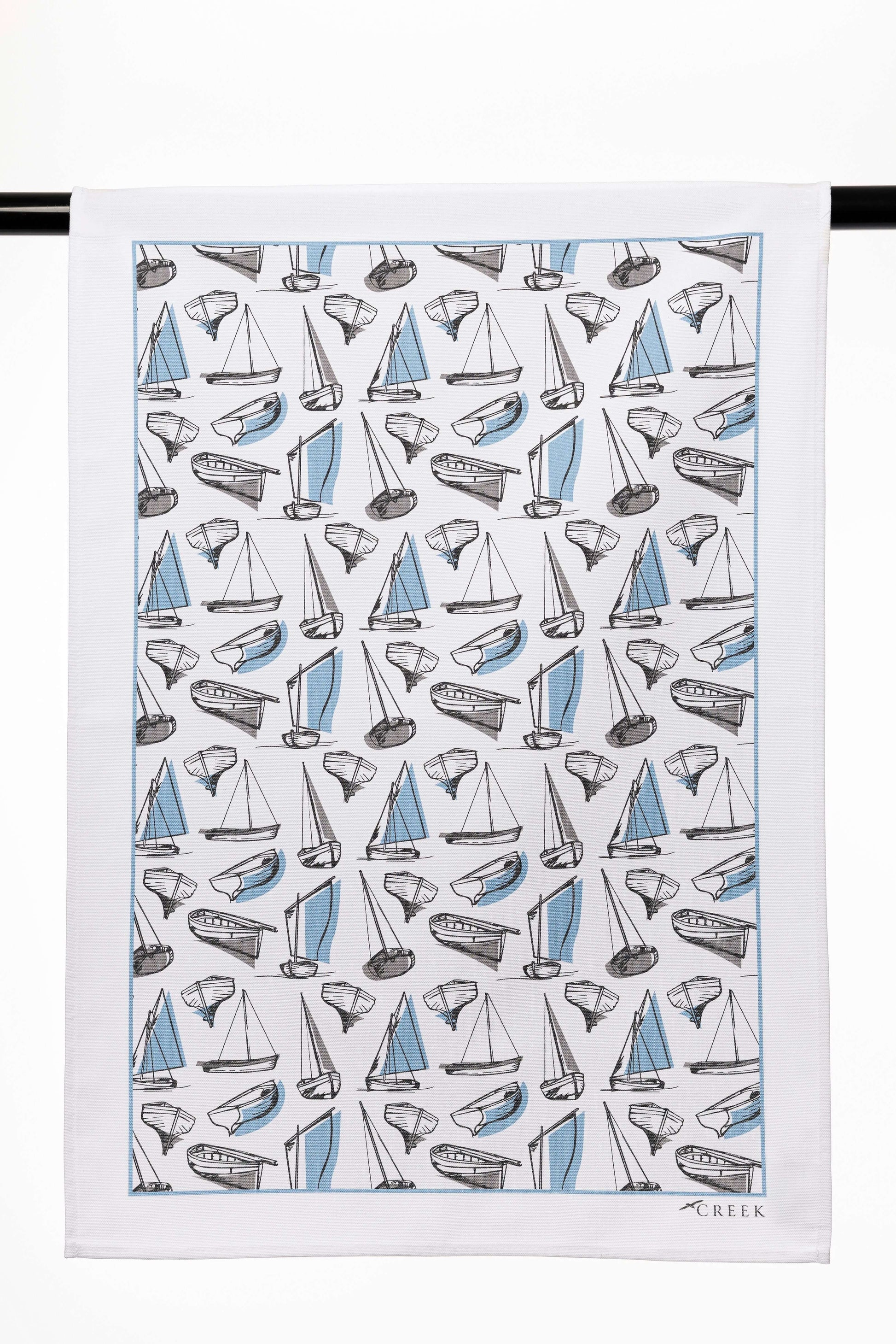 Nautical themed tea towels printed with shell and sea life patterns