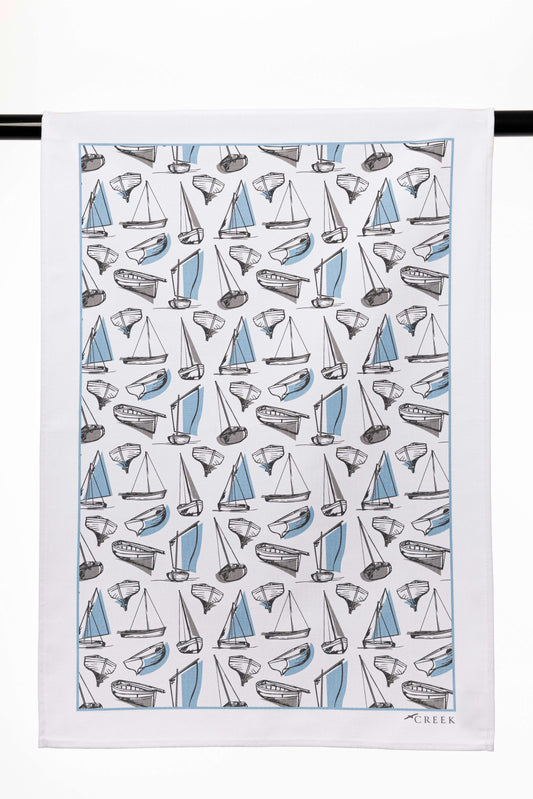 Nautical themed tea towels printed with shell and sea life patterns