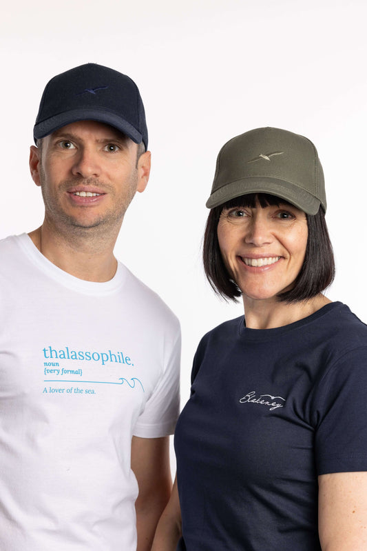 Embroidered coastal cotton cap with Creek bird logo