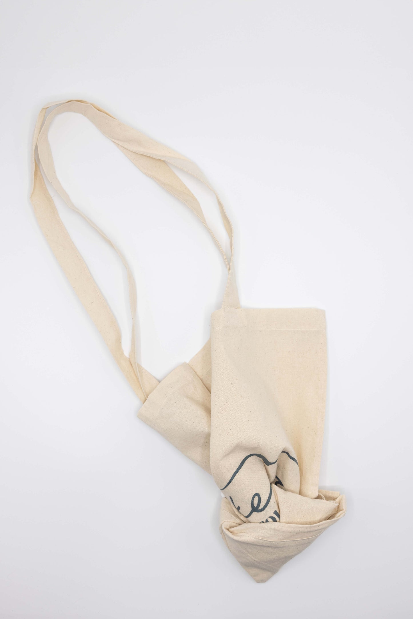 Folding Blakeney cotton shopper bag packed into triangle pouch