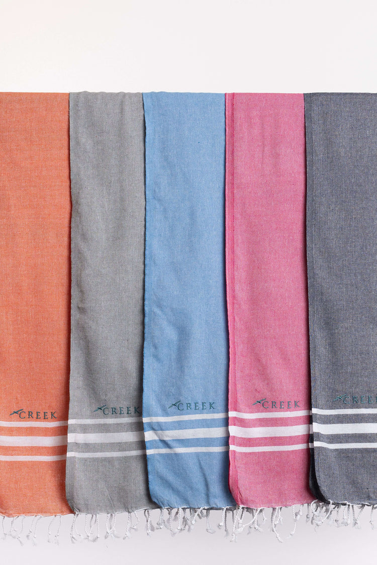 eco-friendly cotton hammam towel with orange stripe