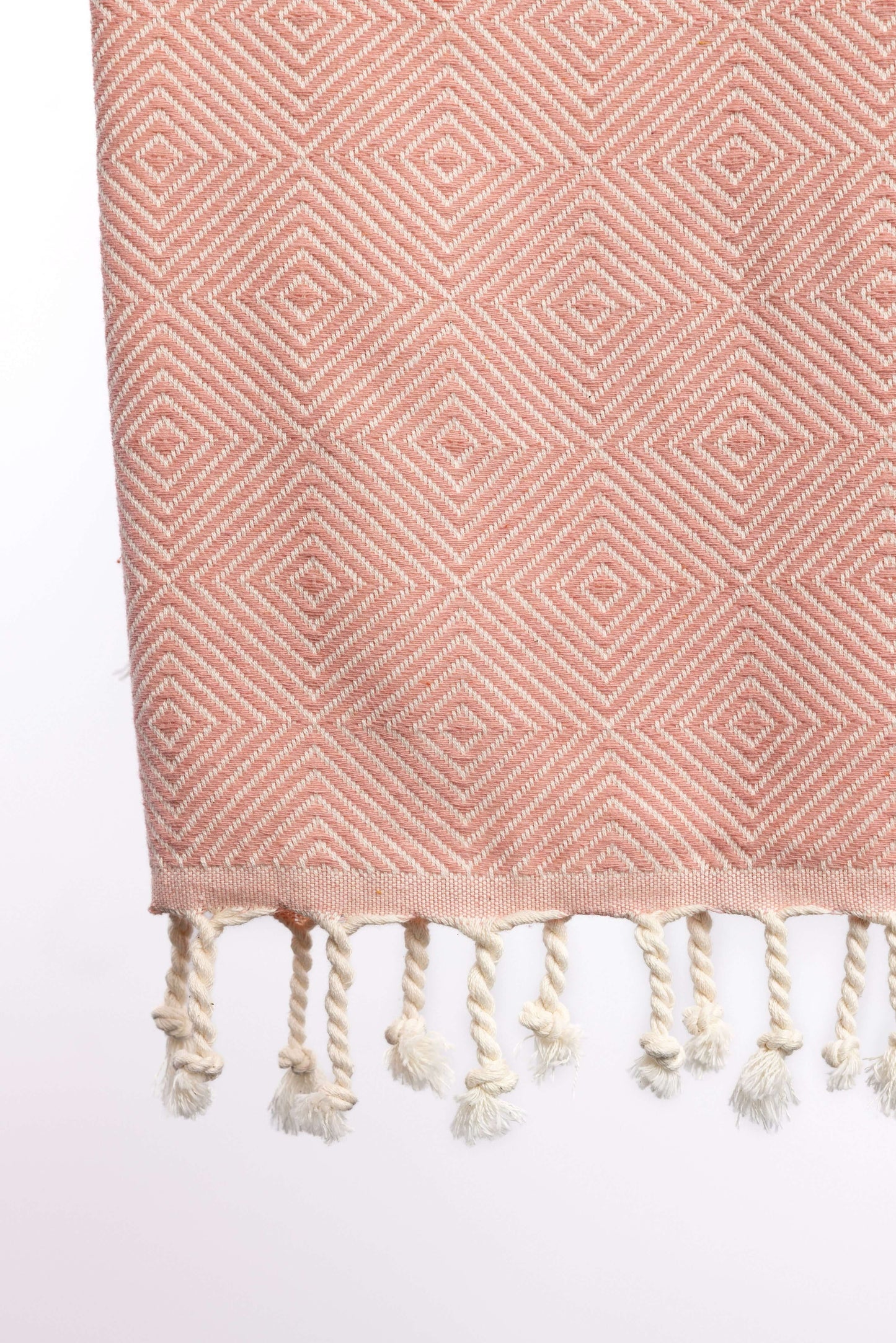 Pink hammam towel with stripe detail – lightweight and stylish for coastal use