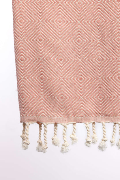 Pink hammam towel with stripe detail – lightweight and stylish for coastal use